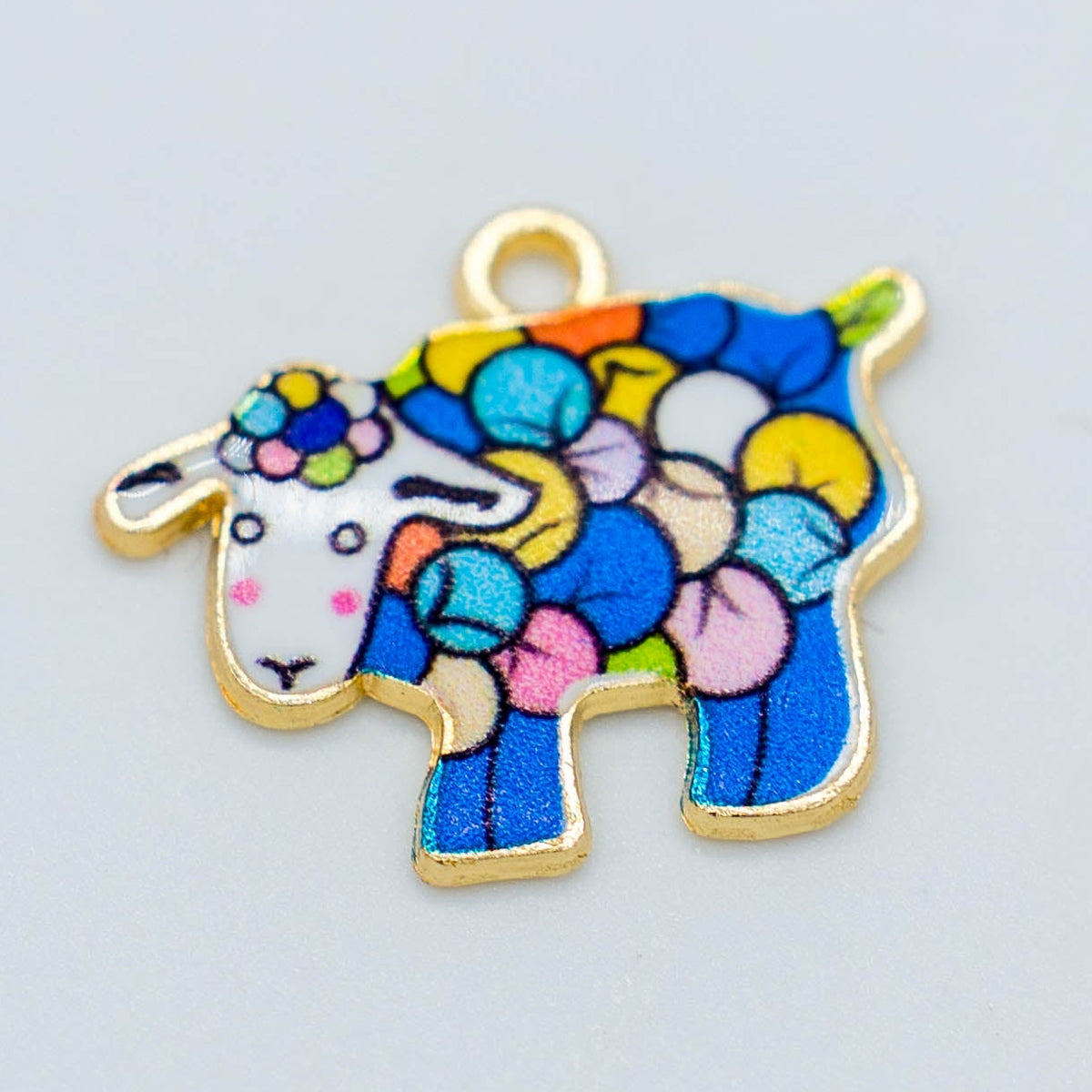 multi-colored metal sheep charm