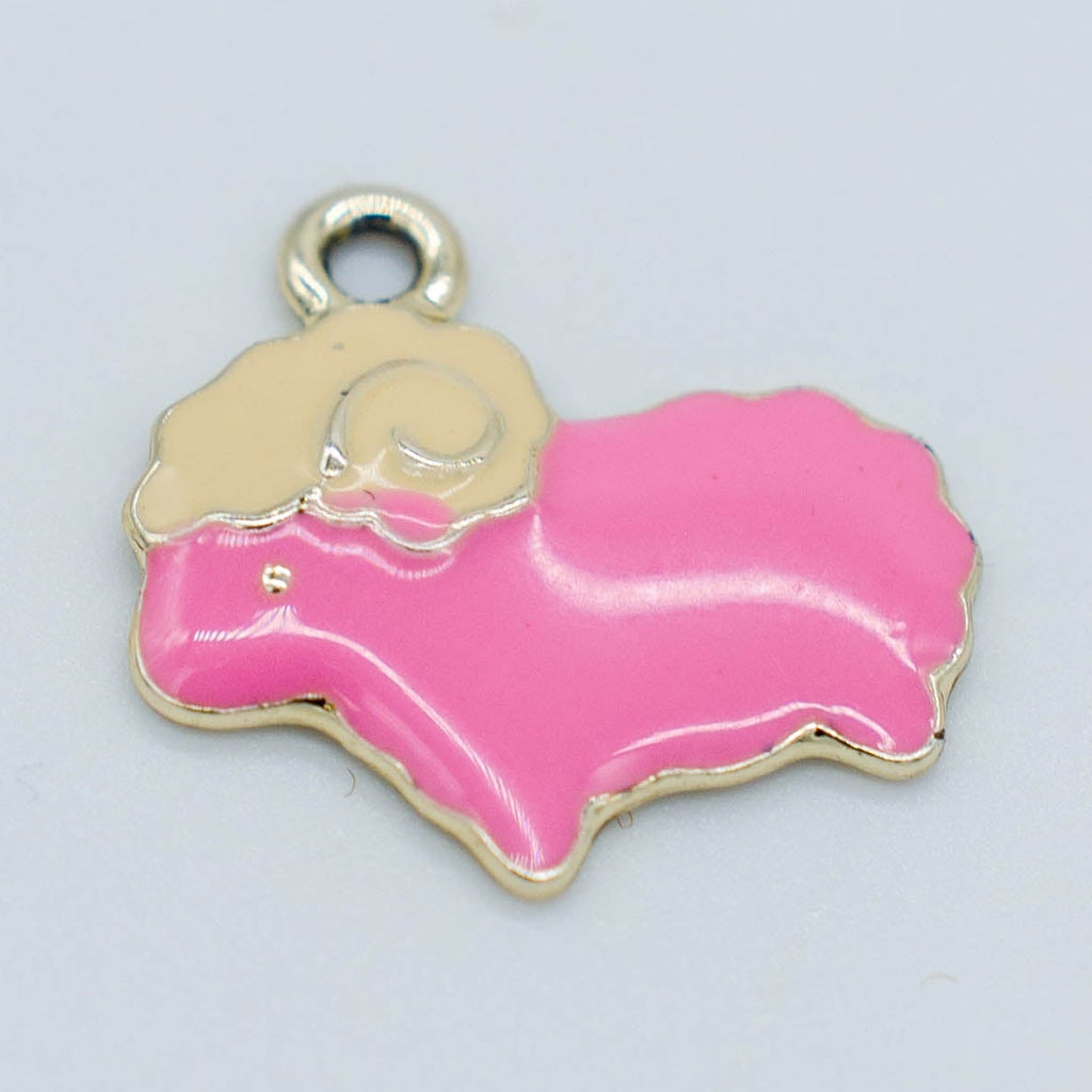 pink metal sheep charm with silver-toned backing