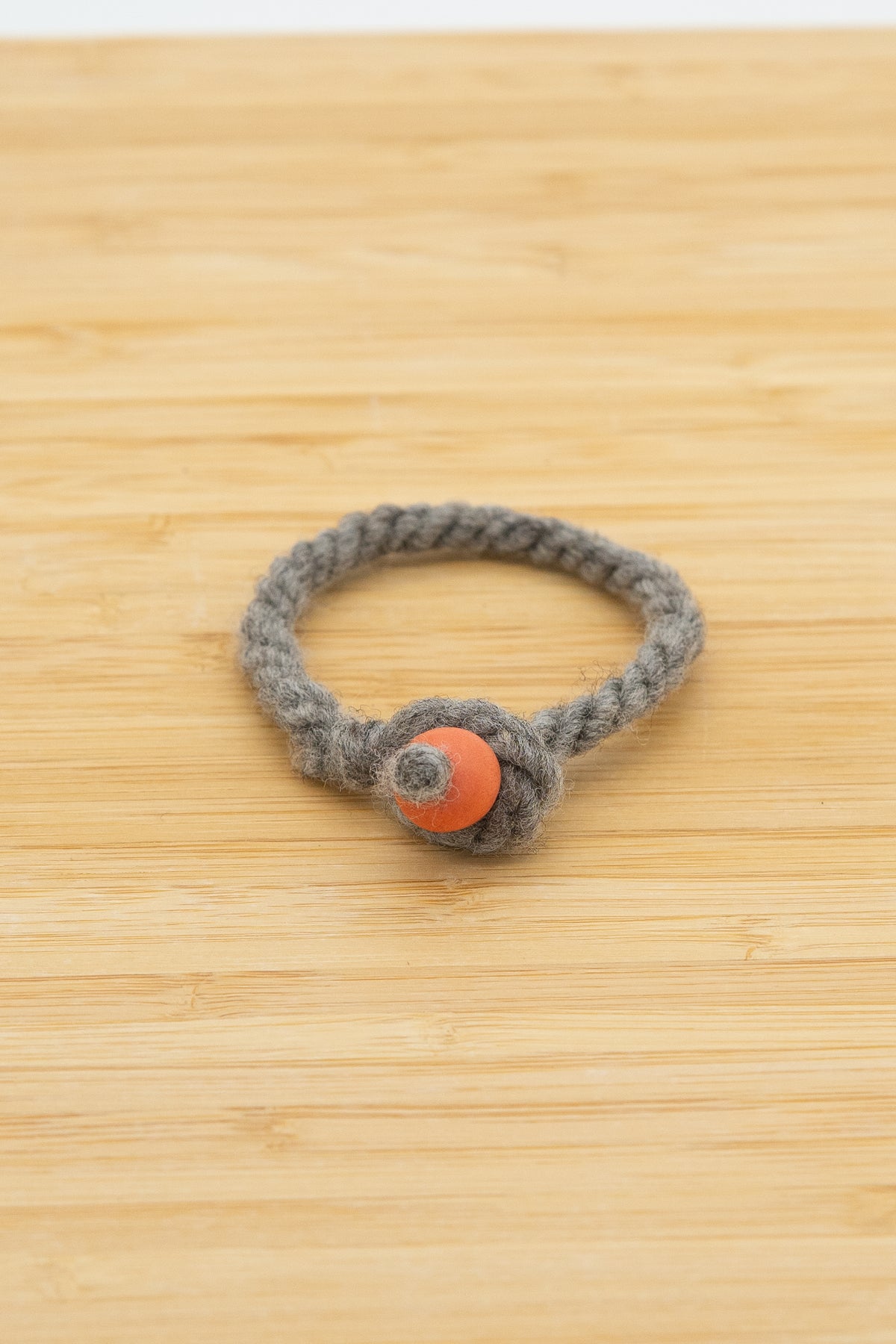 Light gray wool bracelet made from natural Shetland wool from Eddie the ram