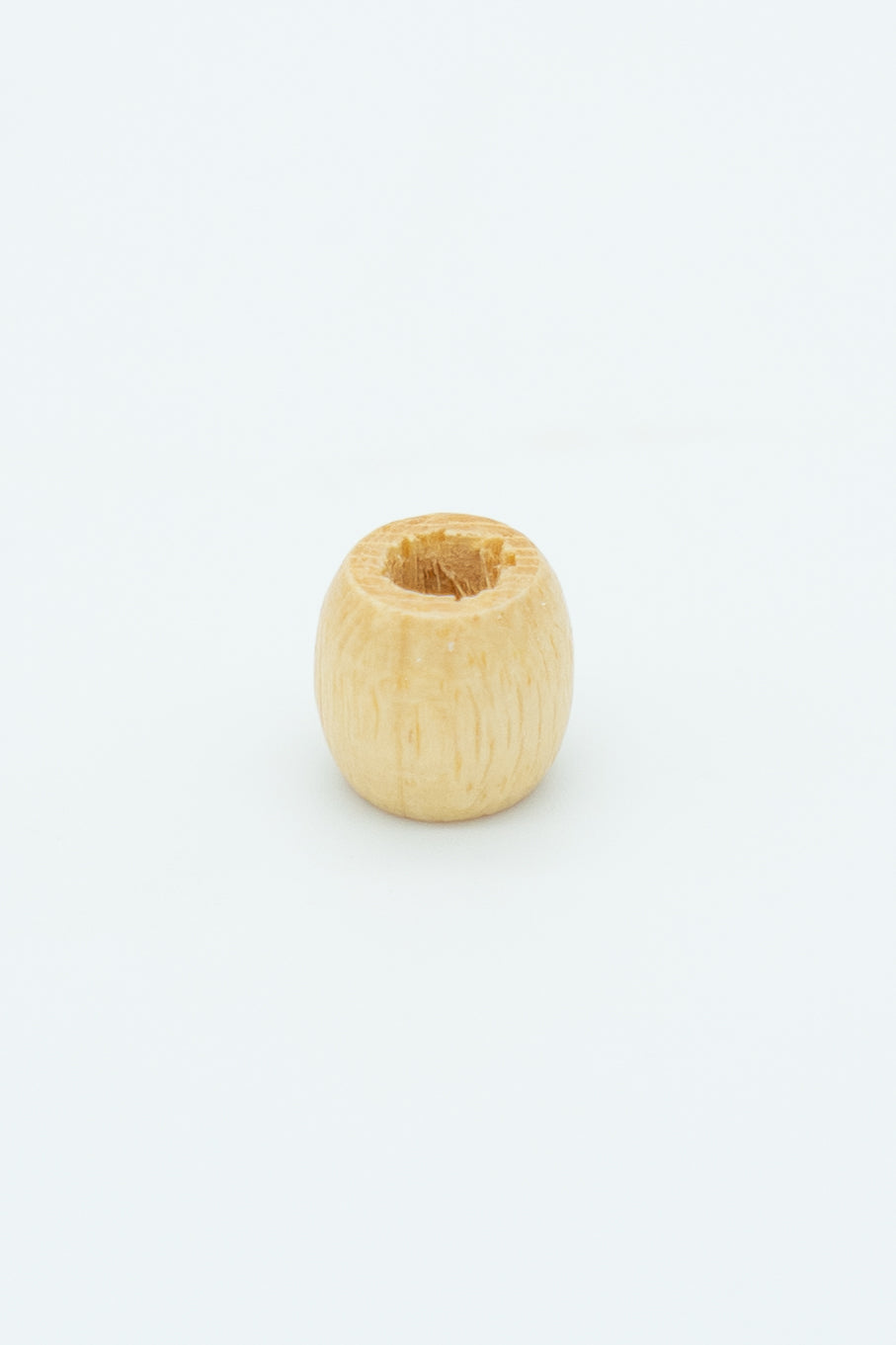 Natural barrel bead solo image for a wool bracelet