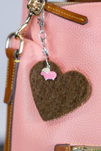 Brown felt heart bag charm with pink sheep on a pink purse