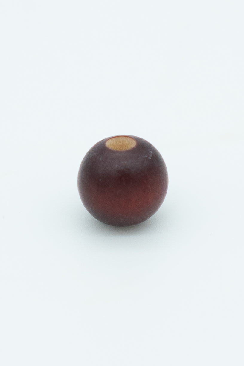 Dark cherry colored wooden bead solo image for a wool bracelet