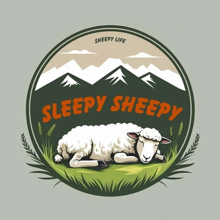Sheep sticker sleeping sheep in the grass with mountains in the background