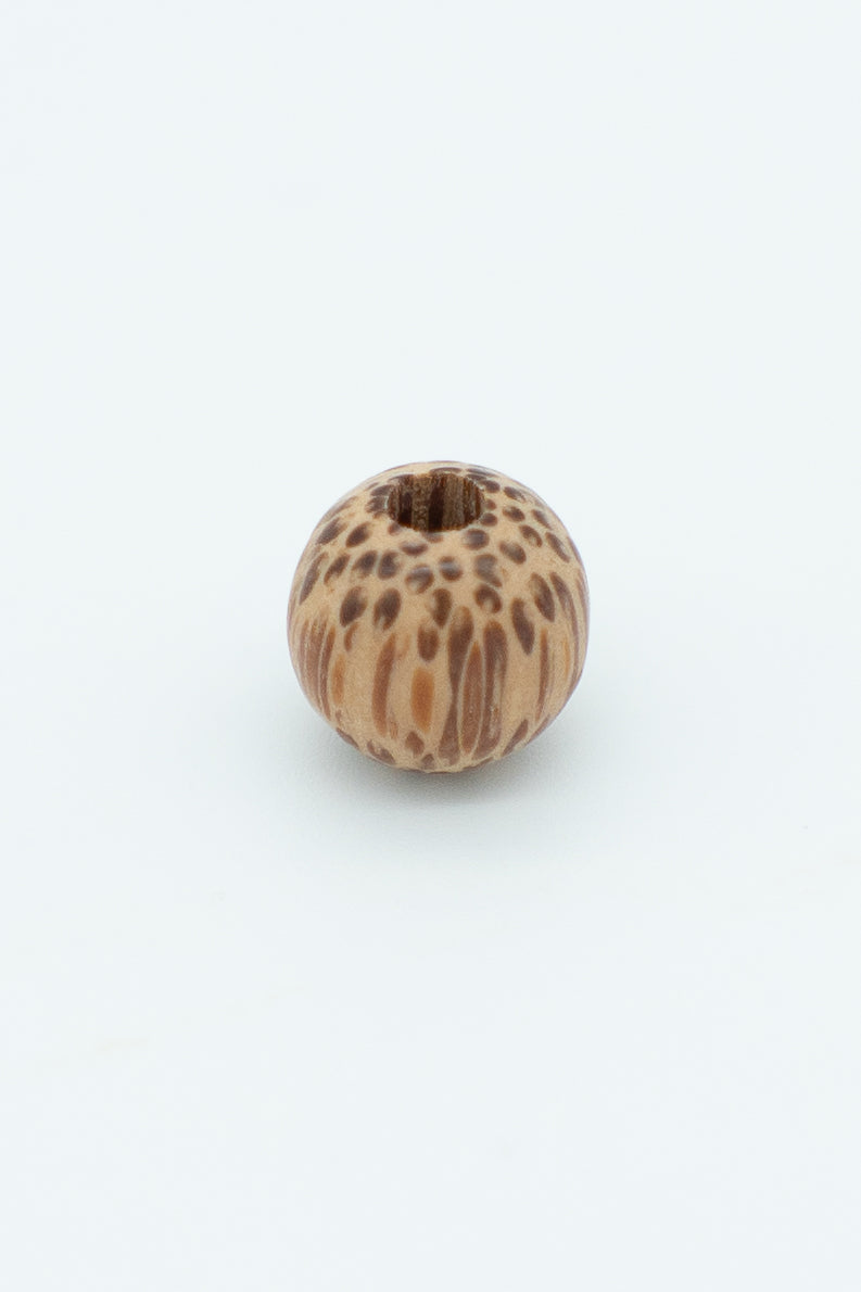 Variegated brown wooden bead solo image for a wool bracelet